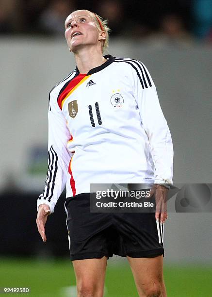 Anja Mittag of Germany looks dejected after missing a goal during the Women's International friendly match between Germany and USA at the Impuls...