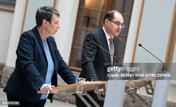 German Environment Minister Barbara Hendricks and Agriculture Minister Christian Schmidt give a joint press conference on February 27, 2018 at the...