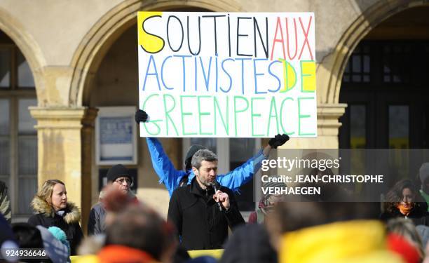 Greenpeace's activists and Managing director of Greenpeace France, Jean-François Julliard speaks in front of the Thionville townhall, eastern France...