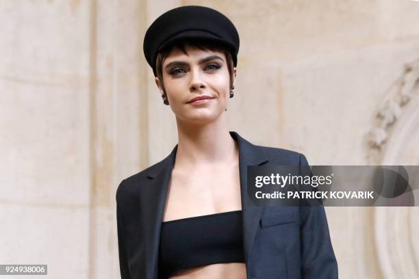 British actress and model Cara Delevingne poses for a photo-call before the Christian Dior's 2018/2019 fall/winter collection fashion show on...