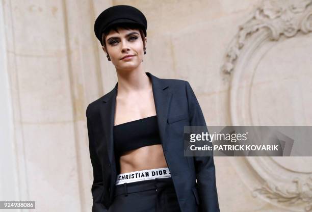 British actress and model Cara Delevingne poses for a photo-call before the Christian Dior's 2018/2019 fall/winter collection fashion show on...