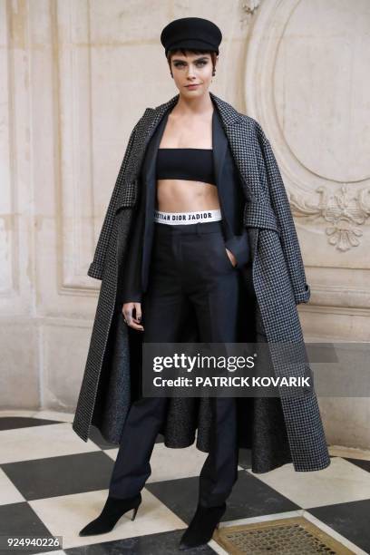 British actress and model Cara Delevingne poses for a photo-call before the Christian Dior's 2018/2019 fall/winter collection fashion show on...