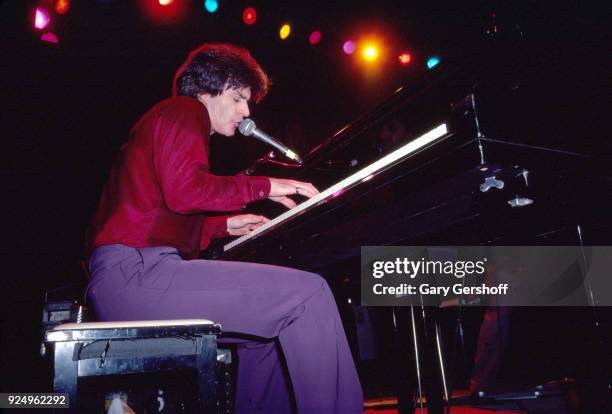 American Rock musician Ricky Nelson plays piano as he performs onstage at the Ritz, New York, New York, February 24, 1981.