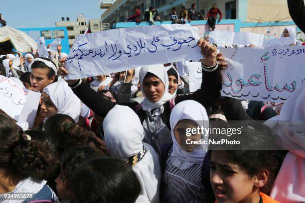 Palestinian students of United Nations-run schools take part in a protest against a U.S. Decision to cut aid, in Khan Younis in the southern Gaza...