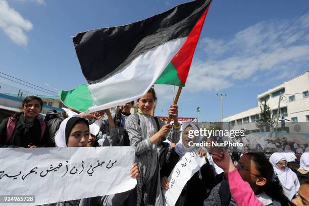 Palestinian students of United Nations-run schools take part in a protest against a U.S. Decision to cut aid, in Khan Younis in the southern Gaza...