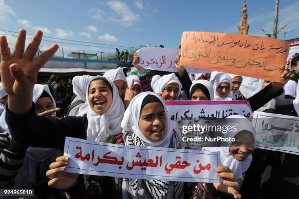 Palestinian students of United Nations-run schools take part in a protest against a U.S. Decision to cut aid, in Khan Younis in the southern Gaza...