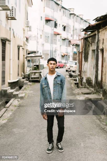 street portrait - man in denim jacket stock pictures, royalty-free photos & images