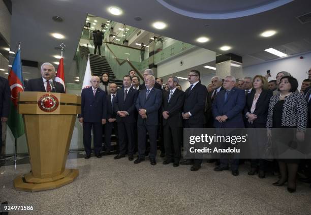 Turkish Prime Minister Binali Yildirim delivers a speech during the opening ceremony of the photograph exhibition entitled 26th anniversary of...