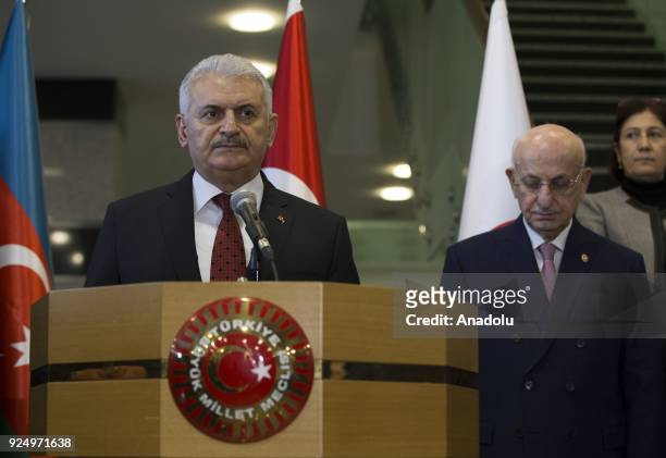 Turkish Prime Minister Binali Yildirim delivers a speech during the opening ceremony of the photograph exhibition entitled 26th anniversary of...