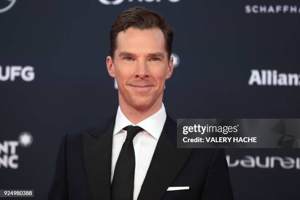 British actor and ceremony host Benedict Cumberbatch poses on the red carpet before the 2018 Laureus World Sports Awards ceremony at the Sporting...