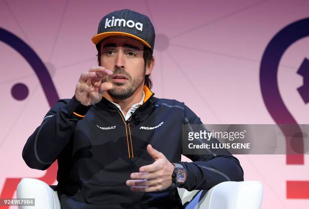 McLaren Spanish Formula 1 driver Fernando Alonso, takes part in a conference on the second day of the Mobile World Congress on February 27, 2018 in...