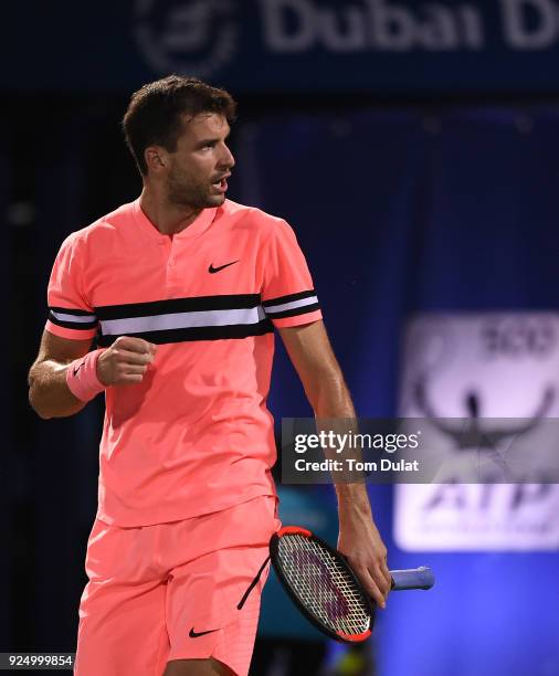 Grigor Dimitrov of Bulgaria celebrates a point during his match against Malek Jaziri of Tunisia on day two of the ATP Dubai Duty Free Tennis...