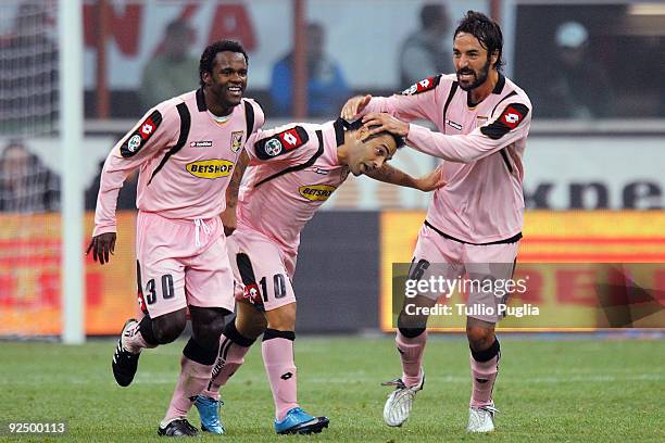 Fabio Simplicio, Fabrizio Miccoli and Mattia Cassani of Palermo celebrate Miccoli's second goal during the Serie A match between FC Internazionale...