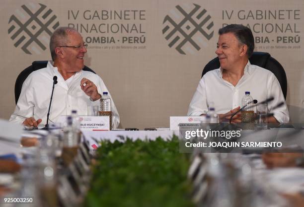 Colombian President Juan Manuel Santos and his Peruvian counterpart Pedro Pablo Kuczynski smile during the 4th Colombia-Peru Binational Cabinet...