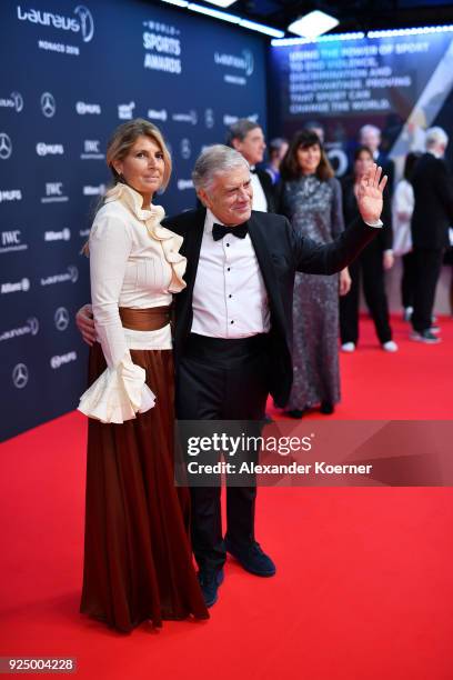 Laureus Academy member Giacomo Agostini and guest attend the 2018 Laureus World Sports Awards at Salle des Etoiles, Sporting Monte-Carlo on February...