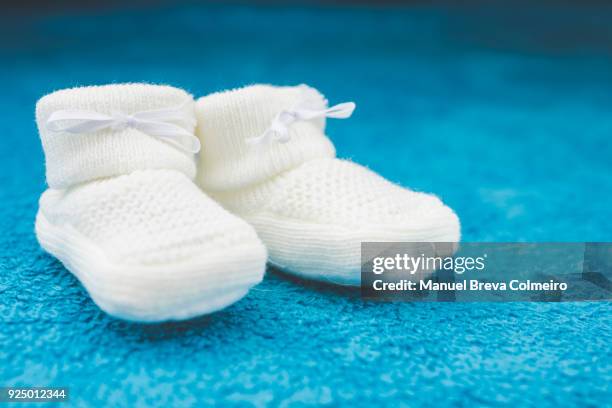 baby booties - baby boot stock pictures, royalty-free photos & images