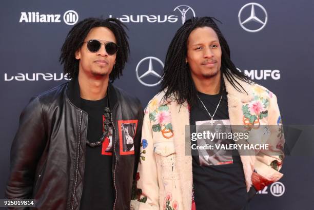 French dancers Laurent and Larry Nicolas Bourgeois aka "Les Twins" pose on the red carpet before the 2018 Laureus World Sports Awards ceremony at the...