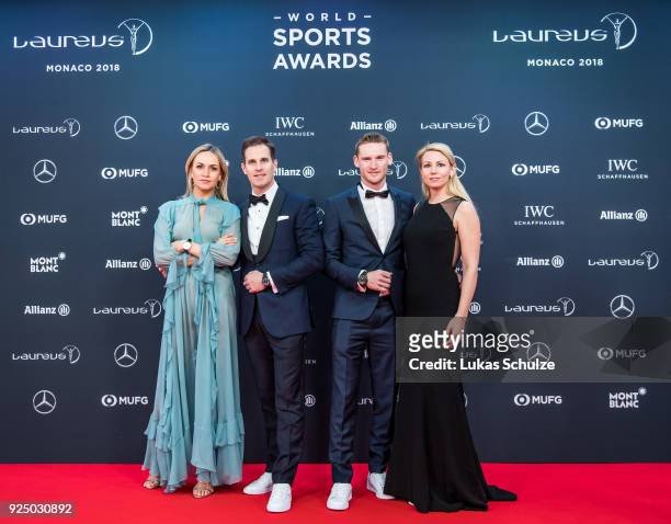 Carmen Jorda, Christoph Grainger-Herr, CEO of IWC Schaffhausen, Maro Engel and Stefanie Engel attend the 2018 Laureus World Sports Awards at the...