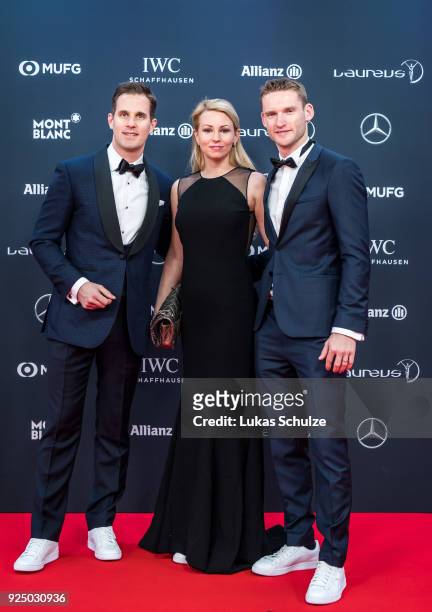 Christoph Grainger-Herr, CEO of IWC Schaffhausen, Stefanie Engel and Maro Engel attend the 2018 Laureus World Sports Awards at the Salle des Etoiles,...