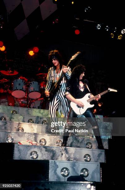 Nikki Sixx, left, and Mick Mars of Motley Crue perform at the Alpine Valley Music Theater in East Troy, Wisconsin, August 18, 1985.