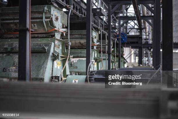 Set of mills grind corn to be turned into ethanol at the Poet Biorefining facility in Jewell, Iowa, U.S., on Wednesday, Feb. 21, 2018. Renewable...