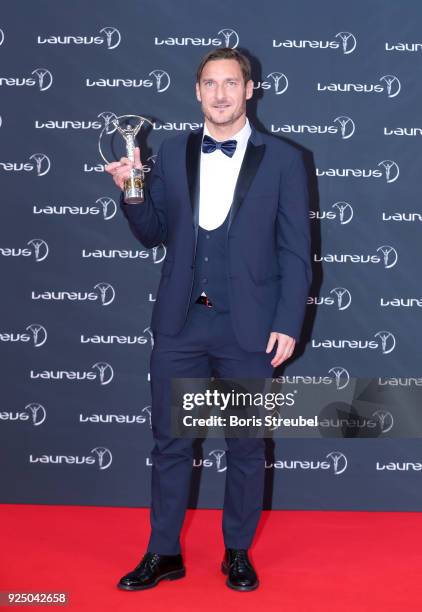Laureus Academy Member Francesco Totti holds his award for Laureus Exceptional Achievement at Salle des Etoiles, Sporting Monte-Carlo on February 27,...