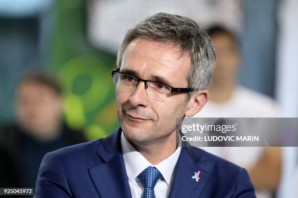 President of the departmental council of Seine-Saint-Denis Stéphane Troussel looks on as French President Emmanuel Macron watches a display of...