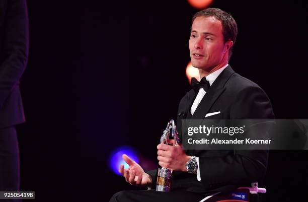 Athlete Marcel Hug speaks on stage after winning the Laureus World Sportsperson of the Year with a Disabilty 2018 Award during the 2018 Laureus World...