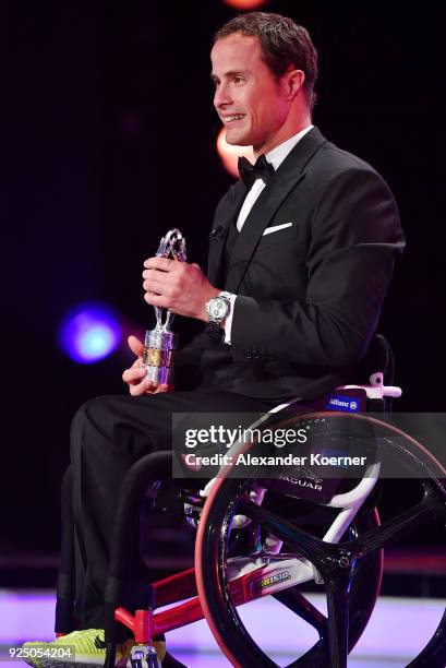 Athlete Marcel Hug speaks on stage after winning the Laureus World Sportsperson of the Year with a Disabilty 2018 Award during the 2018 Laureus World...