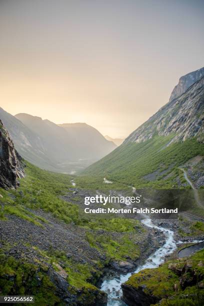 the trollstigen mountain road in møre og romsdal on a summer evening - romsdal stock pictures, royalty-free photos & images