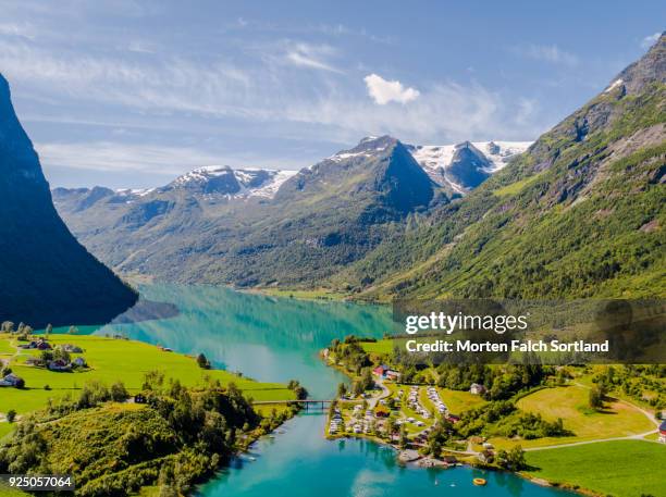 aerial drone shot of lake olden in the briksdalsbreen glacier, norway on a bright summer afternoon - olden foto e immagini stock