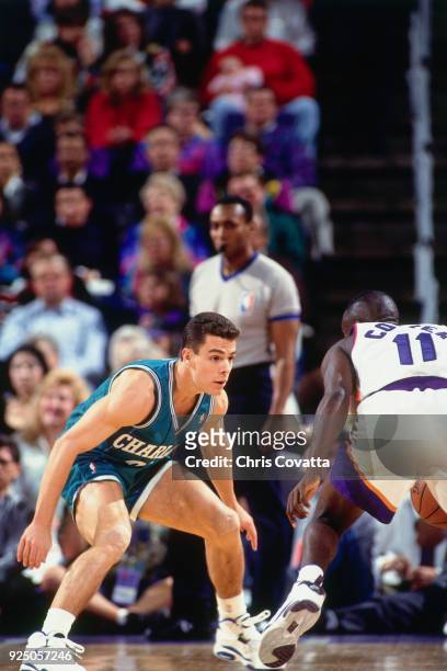 Tony Bennett of the Charlotte Hornets defends during a game on January 11, 1994 at America West Arena in Phoenix, Arizona. NOTE TO USER: User...