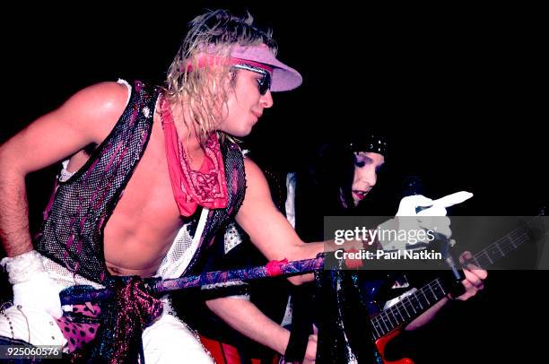 Vince Neil, left, and Mick Mars of Motley Crue perform at the Rosemont Horizon in Rosemont, Illinois, November 1, 1985.