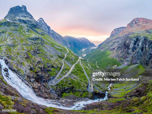 the trollstigen mountain road in møre og romsdal on a summer evening - romsdal stock pictures, royalty-free photos & images