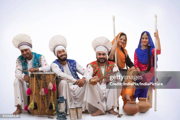 sikh people posing - people celebrate lohri festival stock pictures, royalty-free photos & images