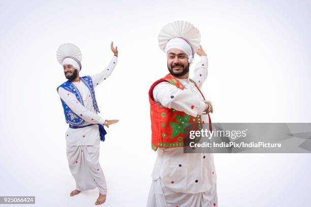 sikh men dancing - people celebrate lohri festival bildbanksfoton och bilder