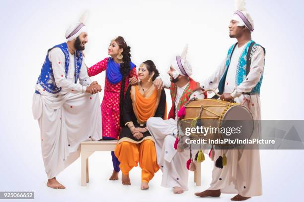 sikh people posing - north indian food stock pictures, royalty-free photos & images