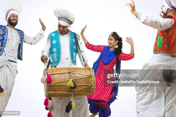 portrait of bhangra dancers - baisakhi stock pictures, royalty-free photos & images