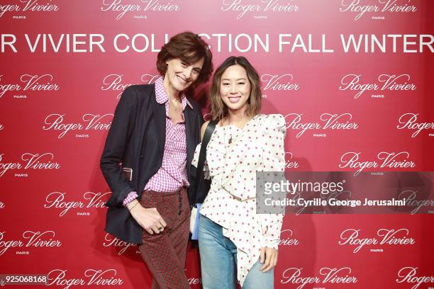Ines De La Fressange and Aimee Song attend the Roger Vivier Fall/Winter 2018 Press Presentation at Espace Cambon Capucines during Paris Fashion week...