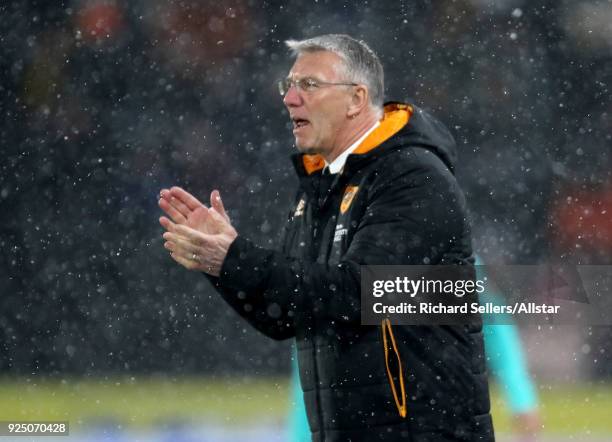 Hull City manager Nigel Adkins gestures during the Sky Bet Championship match between Hull City and Barnsley at KCOM on February 27, 2018 in Hull,...