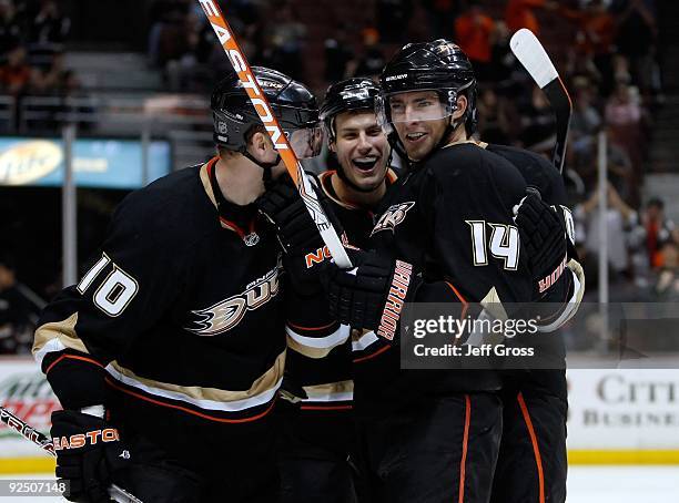 Corey Perry, Ryan Getzlaf and Joffrey Lupul of the Anaheim Ducks celebrate Lupul's goal against the Columbus Blue Jackets at the Honda Center on...