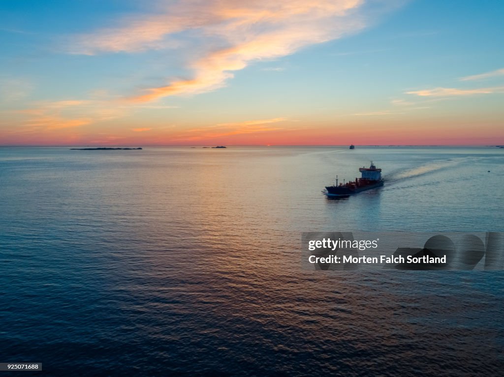 Aerial Shot of Ships Sailing in Austrheim Waters at Sunset, Summertime