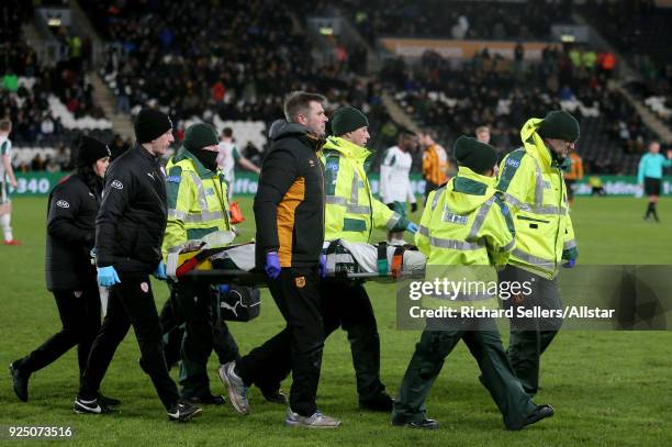 Barnsley's Adam Jackson is streched off during the Sky Bet Championship match between Hull City and Barnsley at KCOM on February 27, 2018 in Hull,...