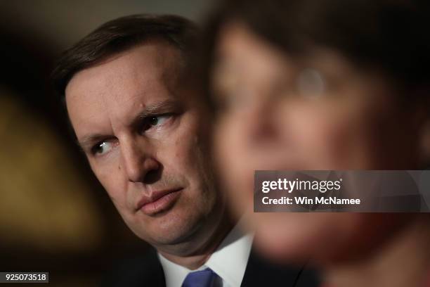 Sen. Chris Murphy listens as Sen. Amy Klobuchar speaks during a press conference at the U.S. Capitol February 27, 2018 in Washington, DC. Senate...