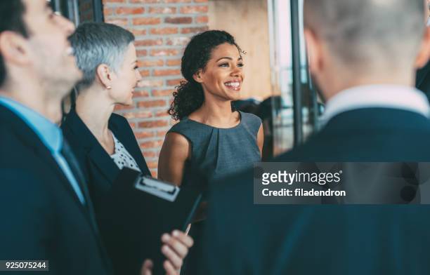 talking with the colleagues - business relationship stock pictures, royalty-free photos & images