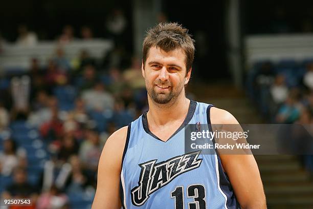 Mehmet Okur of the Utah Jazz takes a break from the action during the preseason game against the Sacramento Kings on October 23, 2009 at Arco Arena...