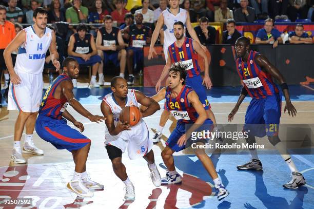 Jamont Gordon, #5 of Cibona competes with Terence Morris, #23 of Regal FC Barcelona and Victor Sada, #24 during the Euroleague Basketball Regular...