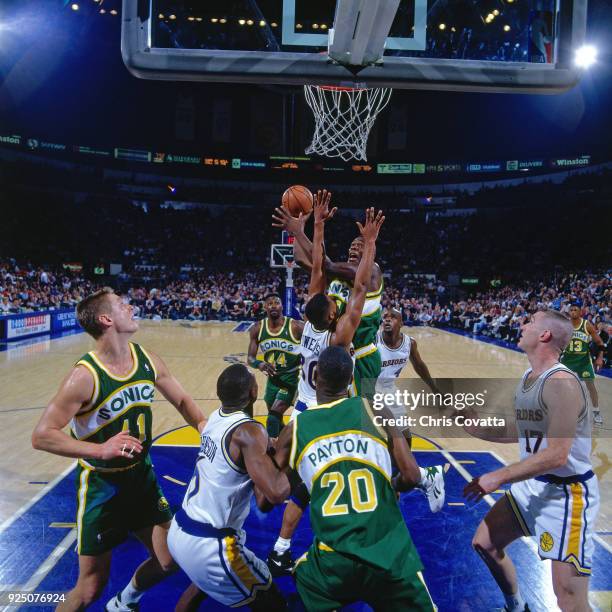 Shawn Kemp of the Seattle SuperSonics shoots during a game played on January 14, 1994 at the Arena in Oakland in Oakland, California. NOTE TO USER:...