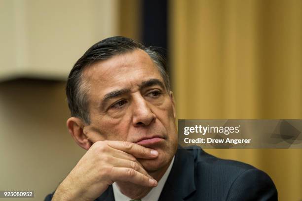 Rep. Darrell Issa listens during a House Judiciary Subcommittee hearing on the proposed merger of CVS Health and Aetna, on Capitol Hill, February 27,...