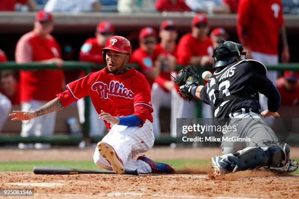 Crawford of the Philedphia Phillies beats out the throw to home plate during the third inning of the Spring Training game against the Detroit Tigers...